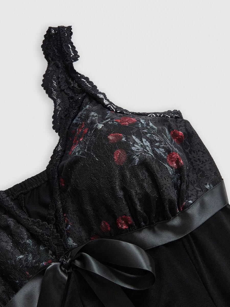 Plus size women's sleeveless cami mini dress with rose plant pattern, contrast lace detailing, spaghetti straps, high waist, and a pleated hem.