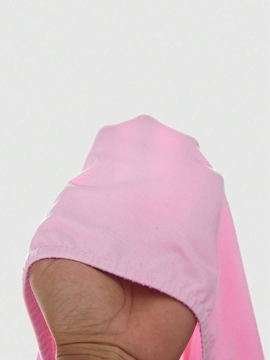Women's striped strapless tube top featuring ruched detailing, flared hem, and stretchy knit fabric.