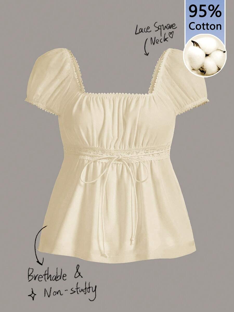 Women's black short puff sleeve top featuring a square neckline, ruched bust detail, and flared ruffle hem.