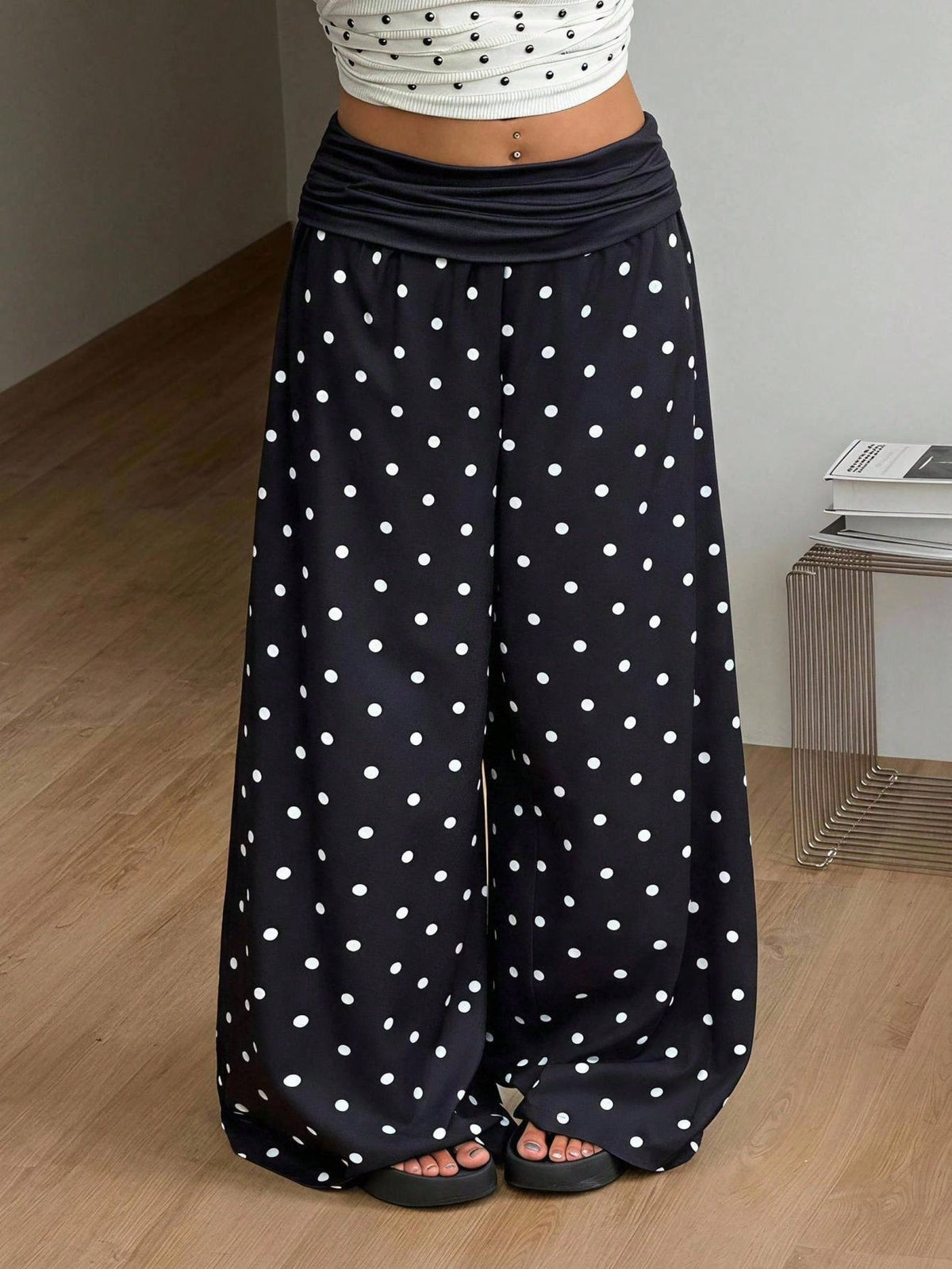 Women's plus size wide leg cotton pants featuring a relaxed loose fit and high waist design.