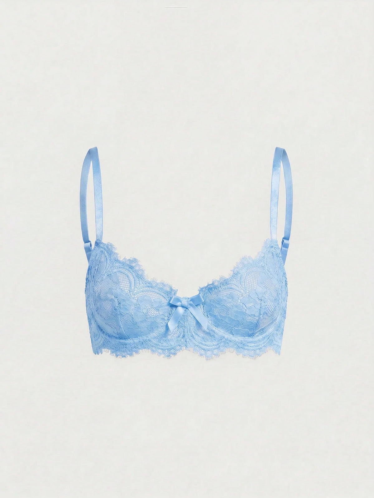Sheer floral lace underwire triangle bra for women featuring adjustable straps and plunge cup design.