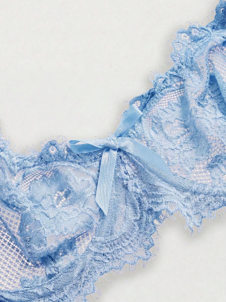 Sheer floral lace underwire triangle bra for women featuring adjustable straps and plunge cup design.