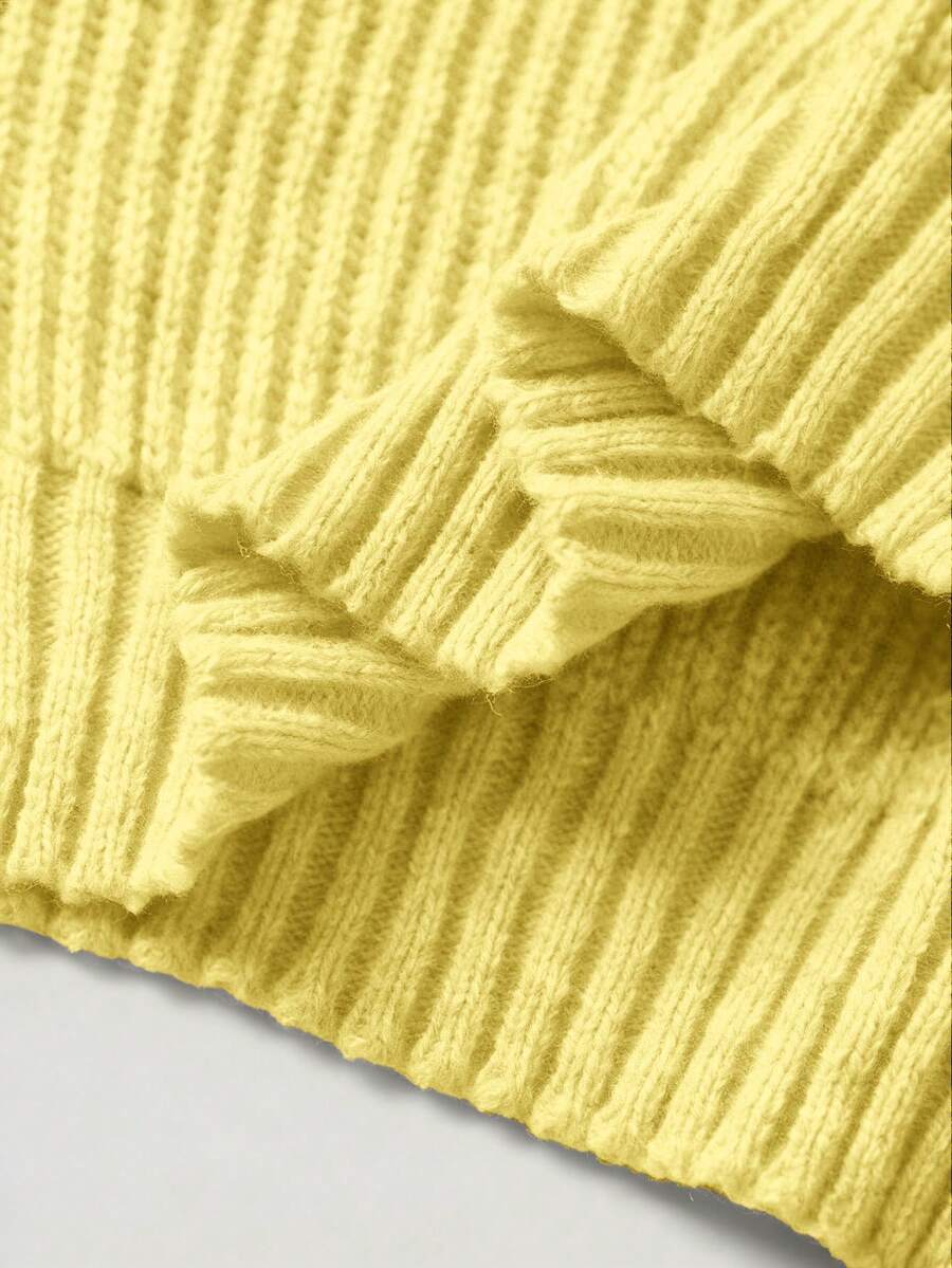 Women's rib-knit crop turtleneck sweater with long drop shoulder sleeves