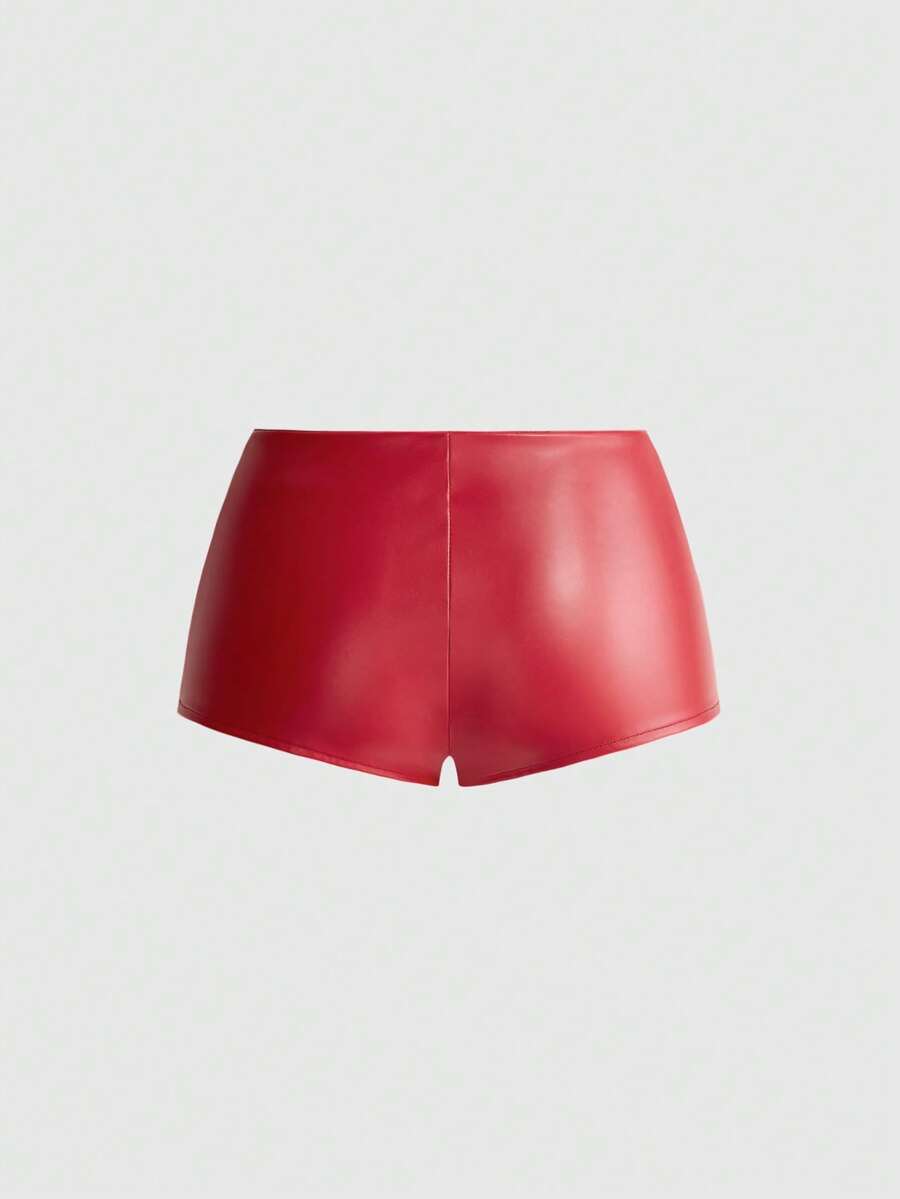 Punk ultra low waist skinny PU mini shorts with flame embroidery, rhinestone details, zipper fly closure, and a graphic Halloween-inspired festival style.