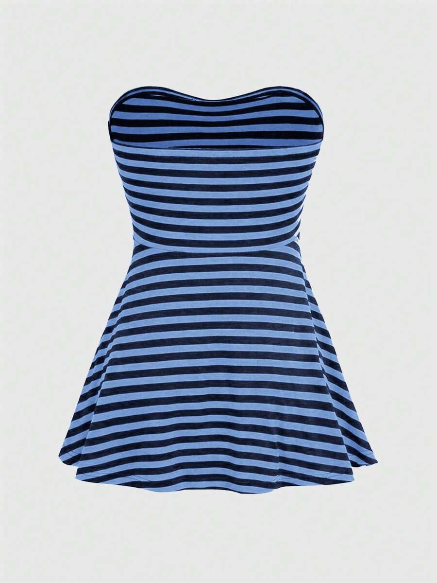 Women's striped strapless tube top featuring ruched detailing, flared hem, and stretchy knit fabric.