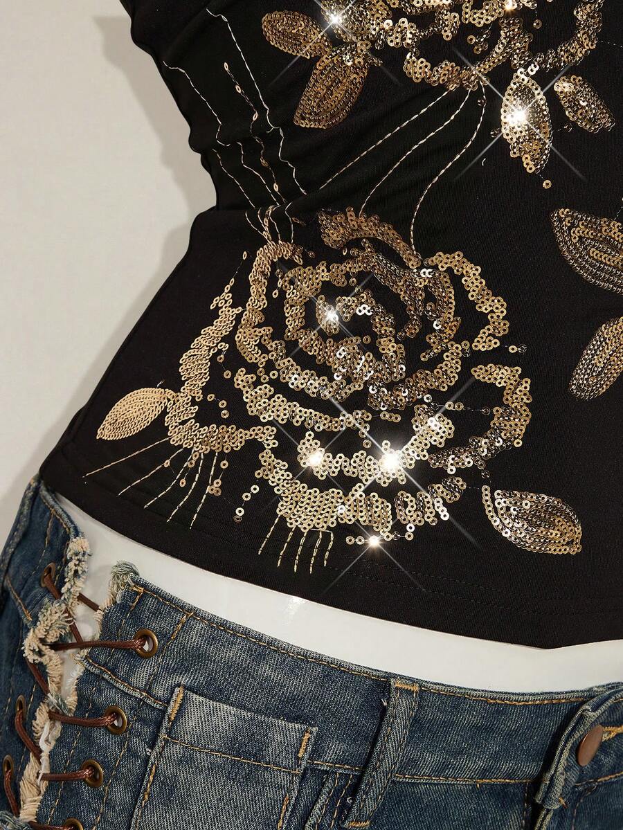 Women's floral embroidered sequin camisole top with thin spaghetti straps and a slim fit design.