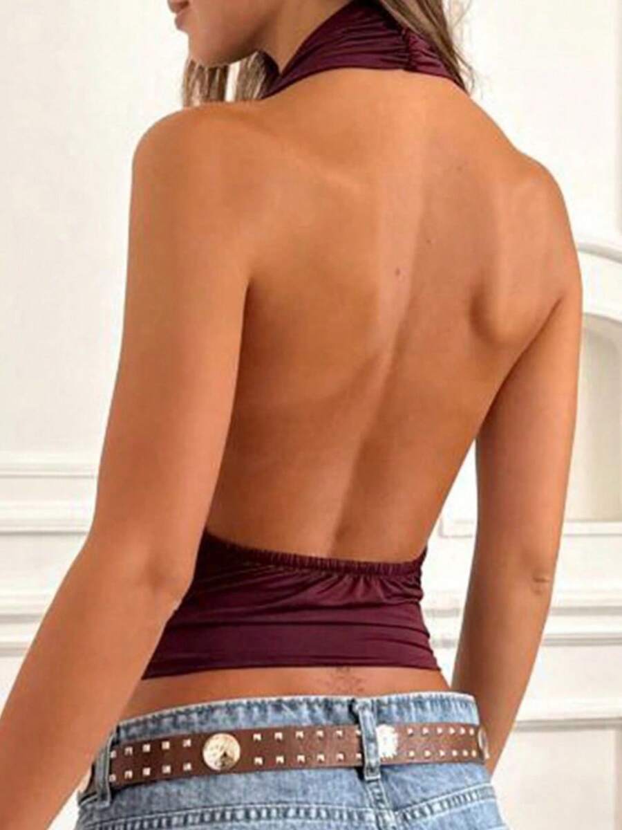 Women’s Y2K halter crop tank top with cowl neck, sleeveless backless design, draped front, knot detail, ruched slim fit, and plain party style.