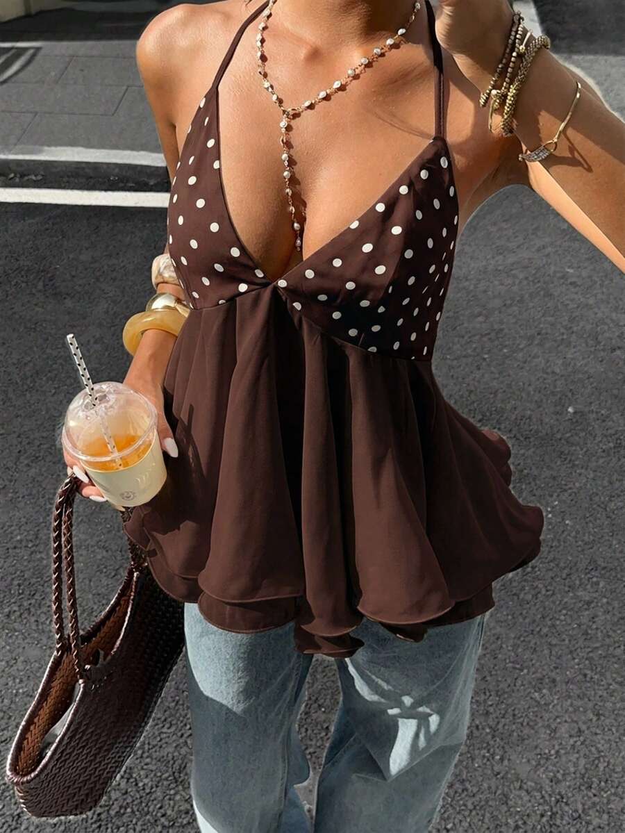 Women's apricot halter cami top with twist detail, studded accents, slim fit, regular length, and flared hem in woven fabric.