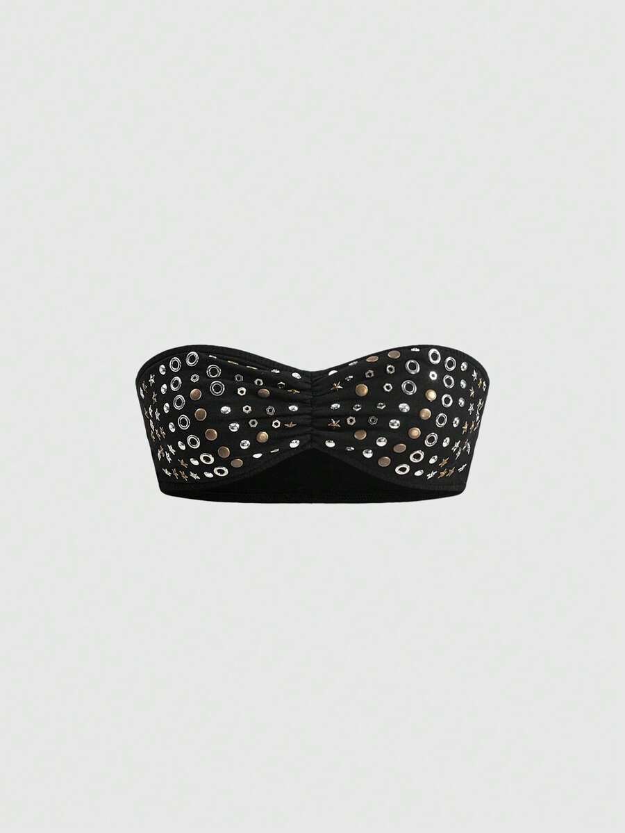 Front view of women's black two-piece set featuring a cowl neck mini bodycon dress and a studded micro cropped tube top.