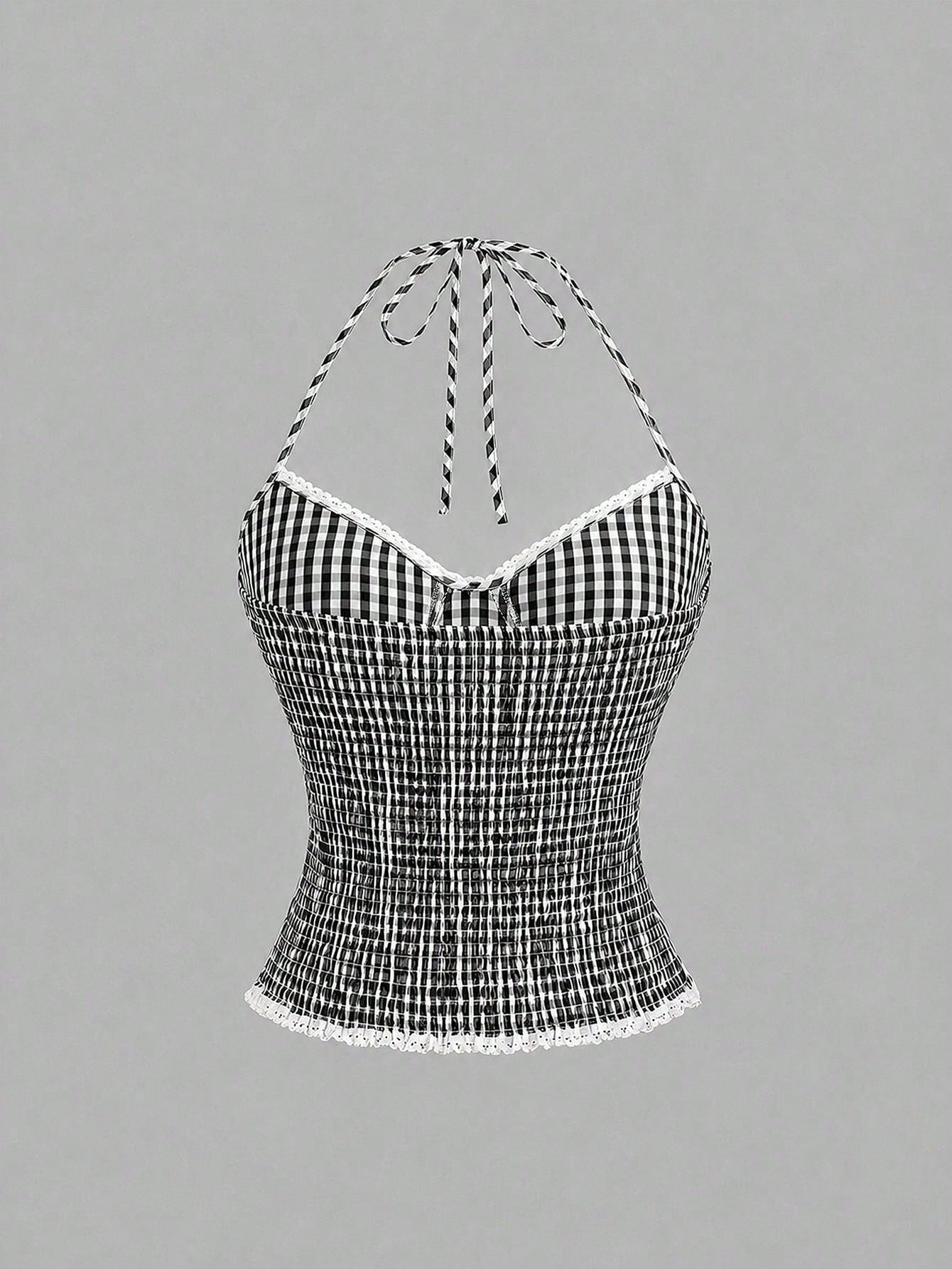 Women's plaid halter tank top with bow trim, knot detail, backless design, and micro crop slim fit.