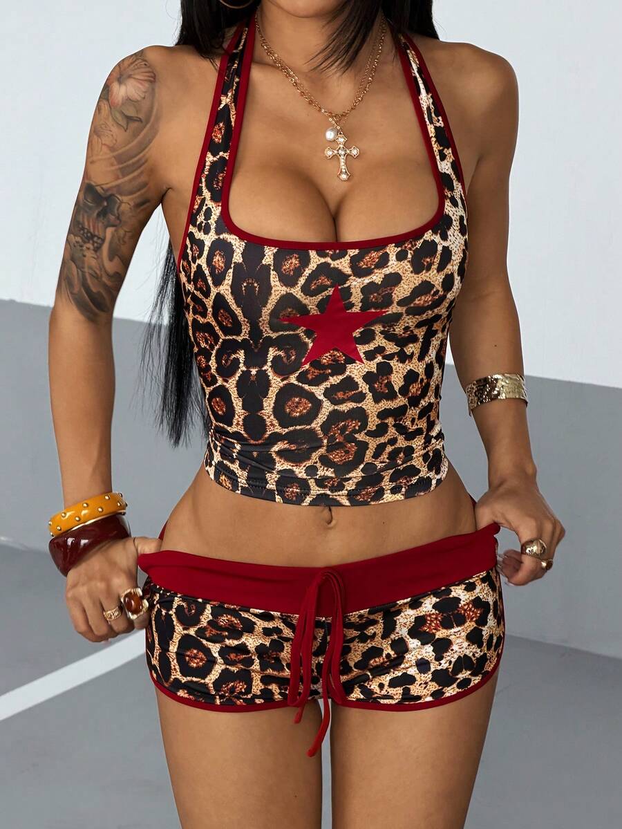 Women's multicolor halter camisole and mini shorts two-piece outfit with backless knot detail, contrast binding, and textured pattern.