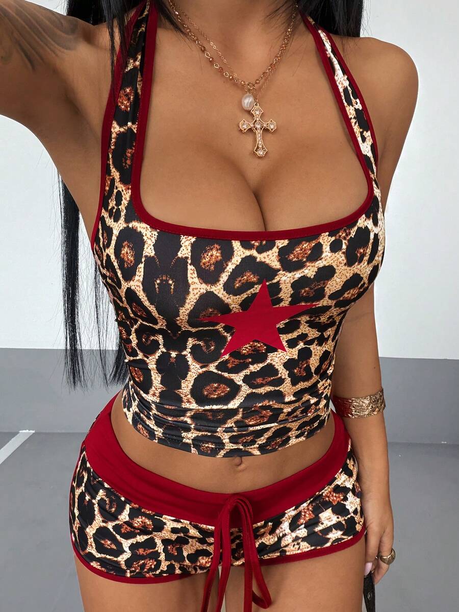 Women's multicolor halter camisole and mini shorts two-piece outfit with backless knot detail, contrast binding, and textured pattern.