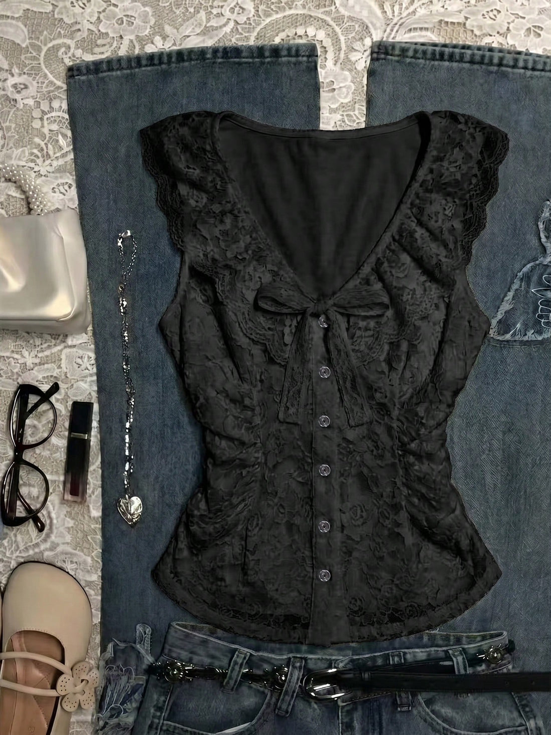 Franclia women's slim fit V-neck sleeveless tank top featuring lace patchwork detailing and a bow accent.