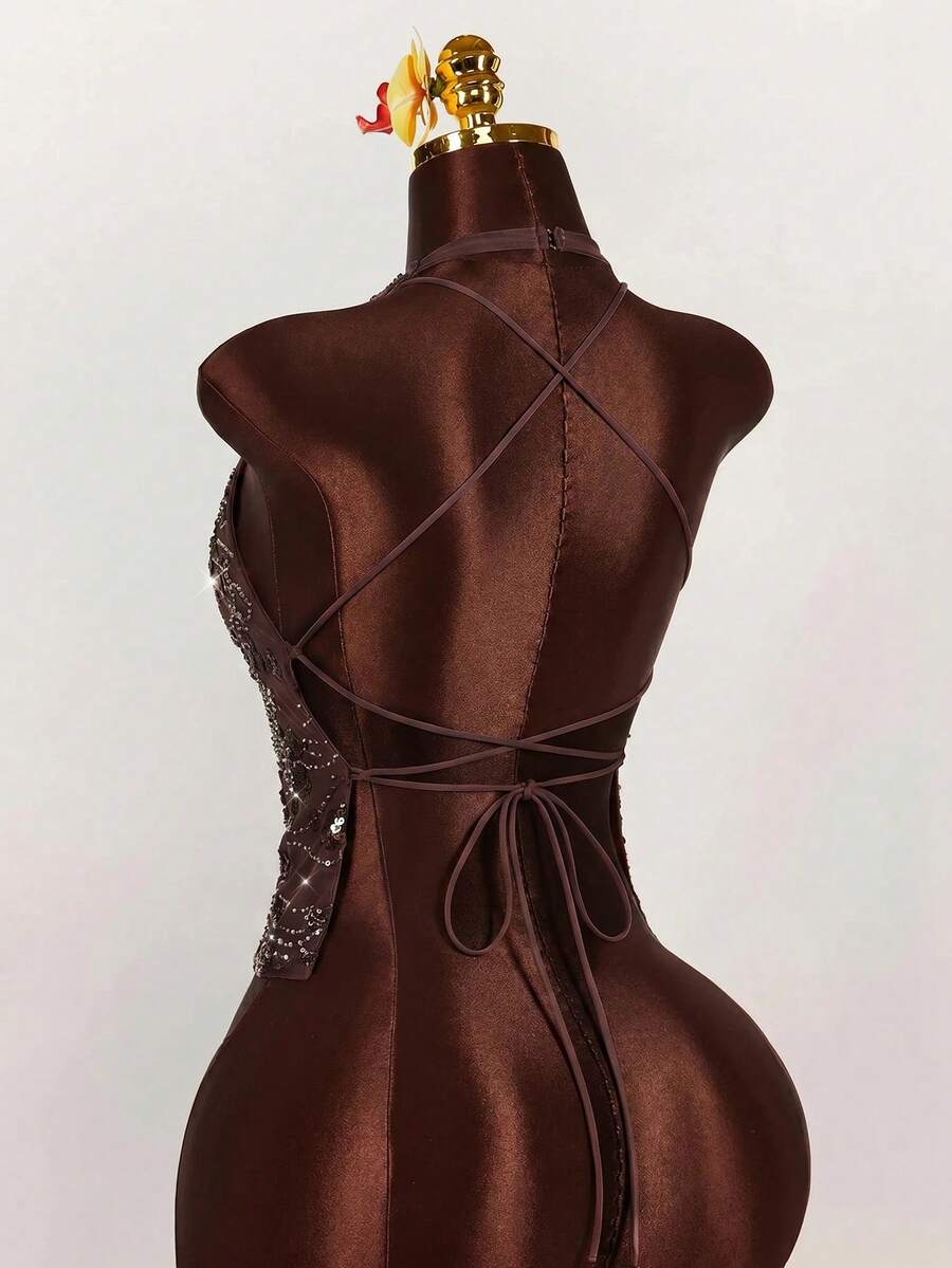 Women's embroidered sequin halter cami top featuring a deep V-neck, backless party design, and slim fit silhouette.