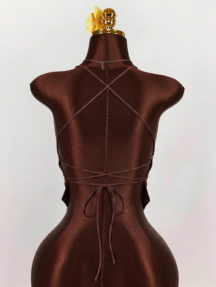 Women's embroidered sequin halter cami top featuring a deep V-neck, backless party design, and slim fit silhouette.