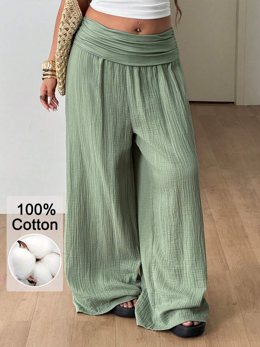 Women's plus size wide leg cotton pants featuring a relaxed loose fit and high waist design.
