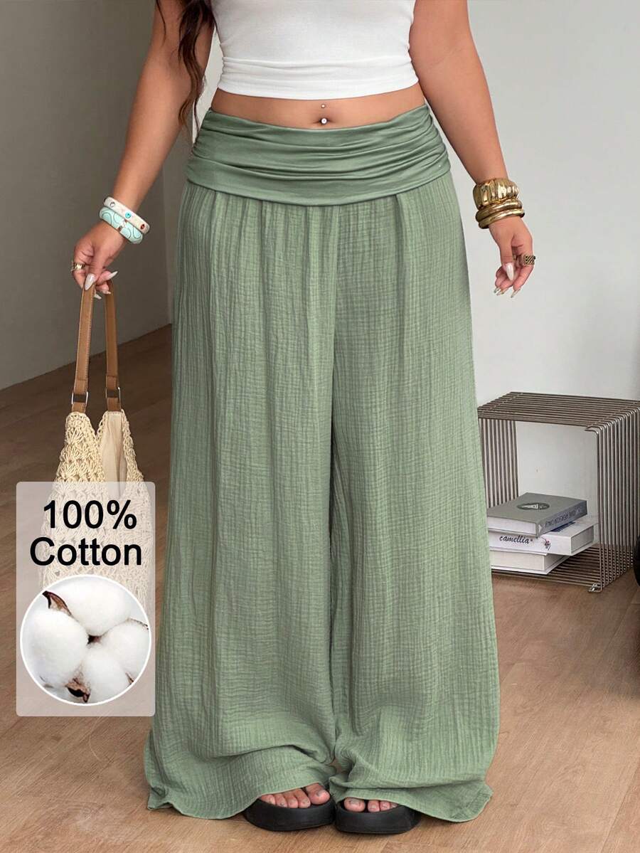 Women's plus size wide leg cotton pants featuring a relaxed loose fit and high waist design.