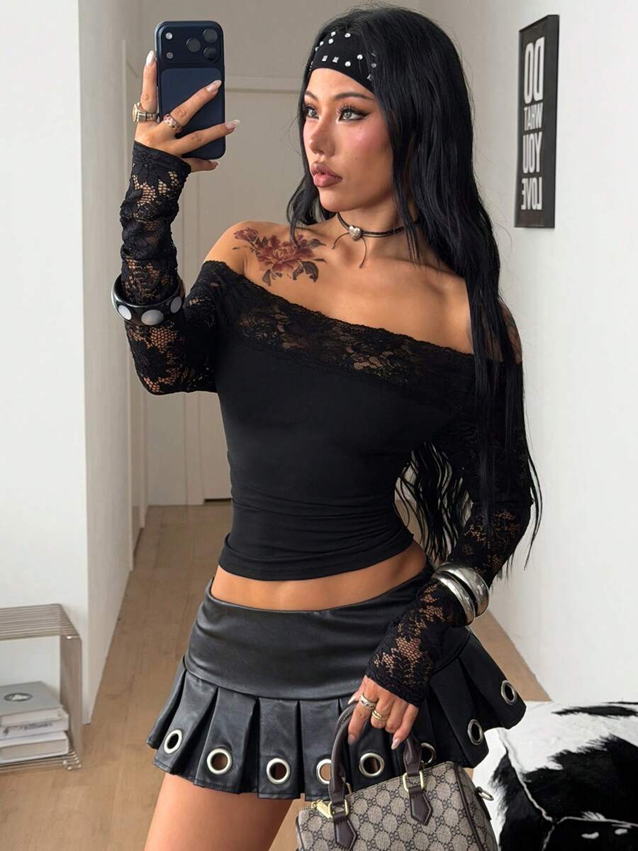 Women's slim fit off the shoulder long sleeve knitted top featuring contrast lace trim and ruched accents.
