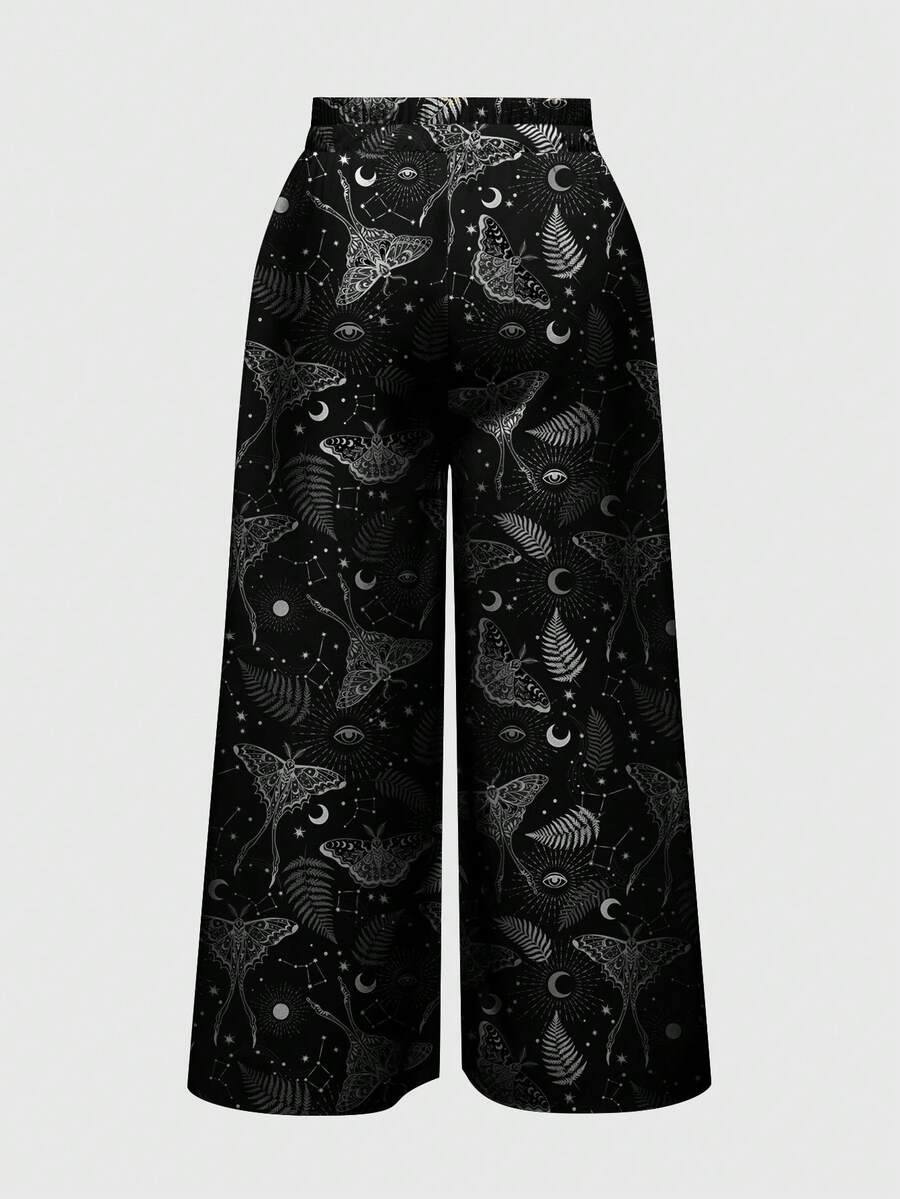Women's plus size black gothic wide leg pants with split thigh detail and celestial moth, sun, and star pattern.
