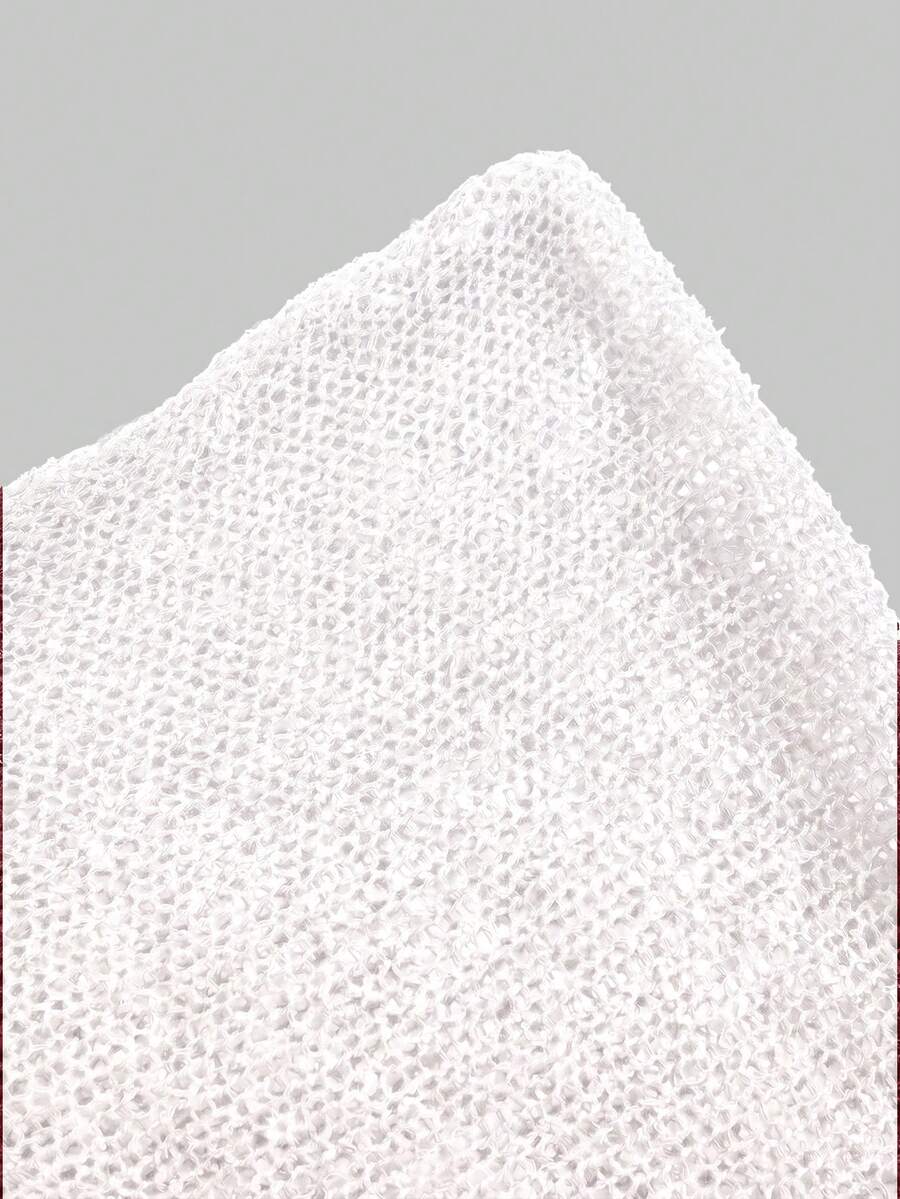 Women's casual hollow knit poncho top with boat neck, cloak sleeves, and asymmetrical hem