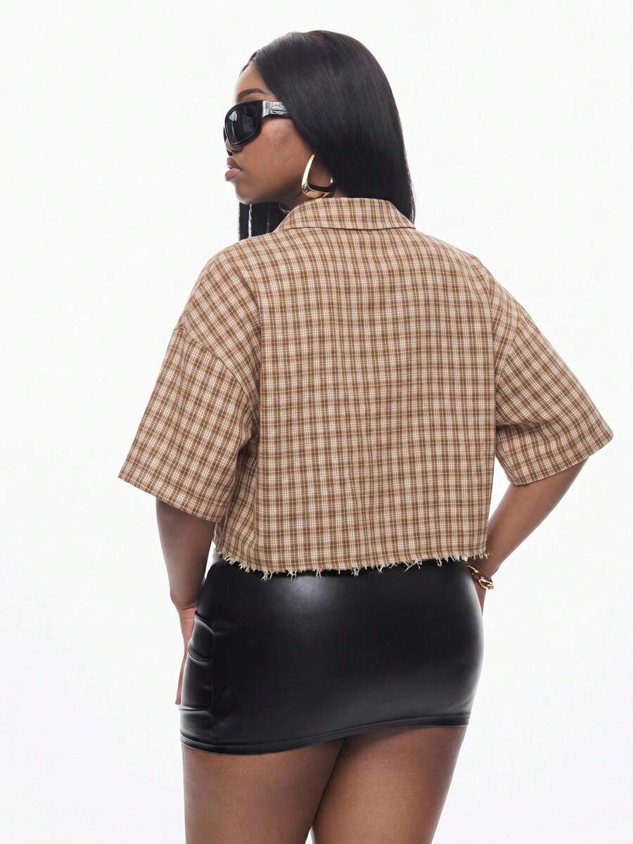 Women's plaid crop shirt with button front, chest pocket, short sleeves, and loose casual fit.