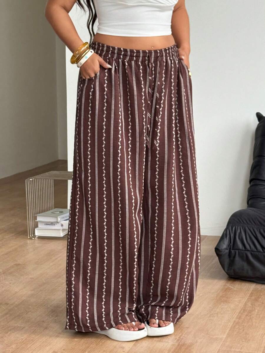 Women's loose straight leg cotton pants featuring a high waist with an adjustable drawstring knot and functional side pockets.