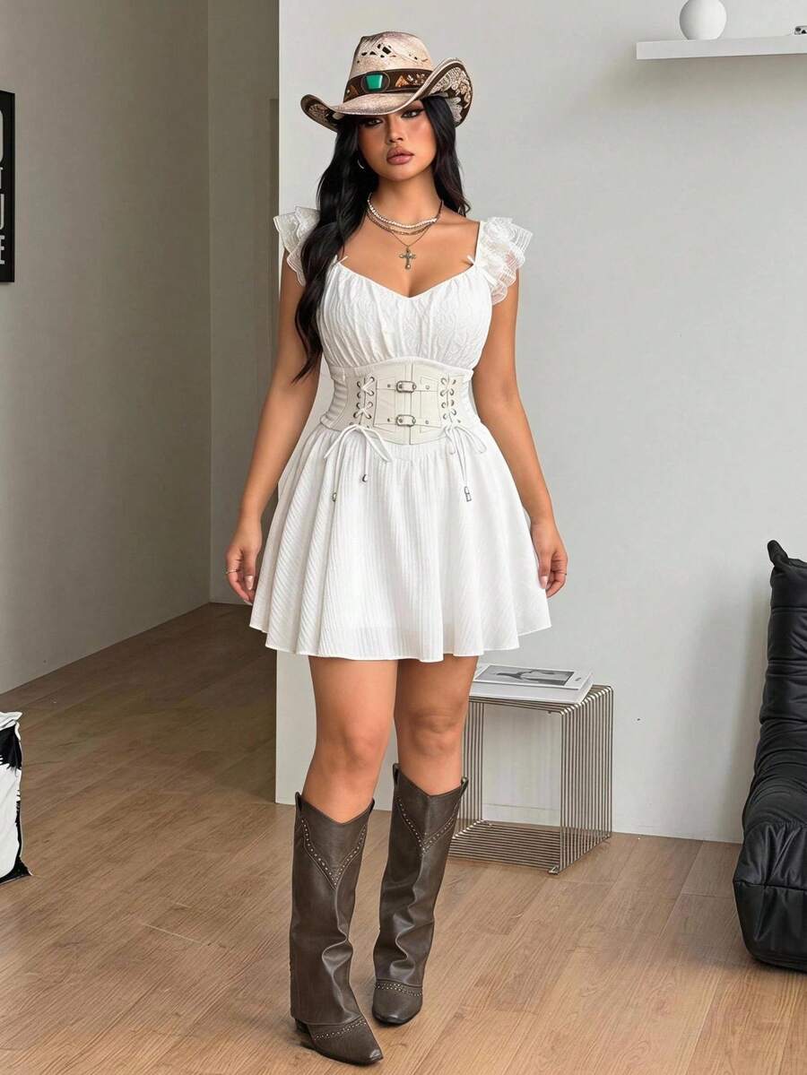 Front view of a white mini dress with sweetheart ruched bust, front lace-up detail, and flounce cap sleeves.