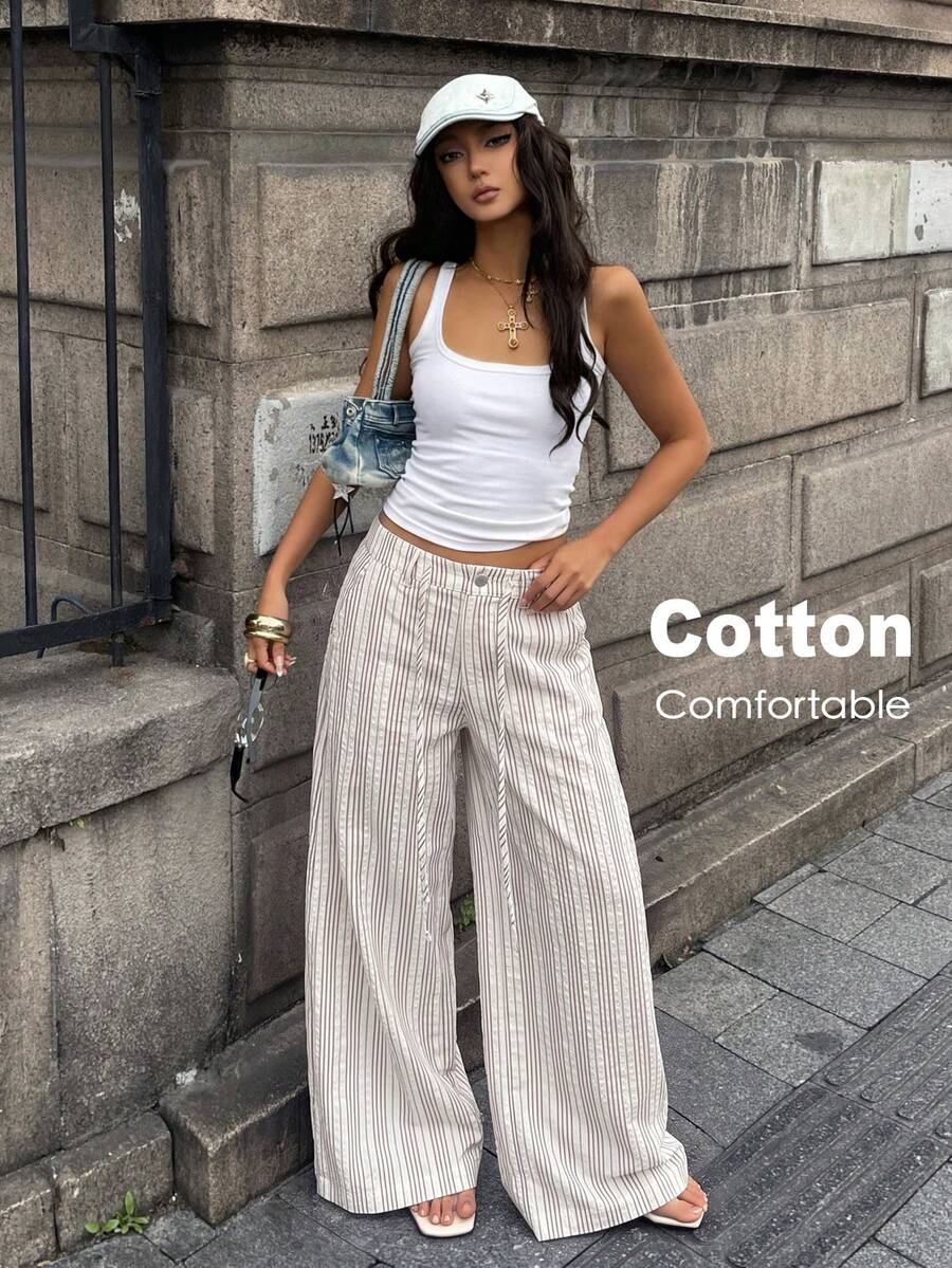 Women's casual straight leg striped woven pants featuring a low waist and zipper fly closure.