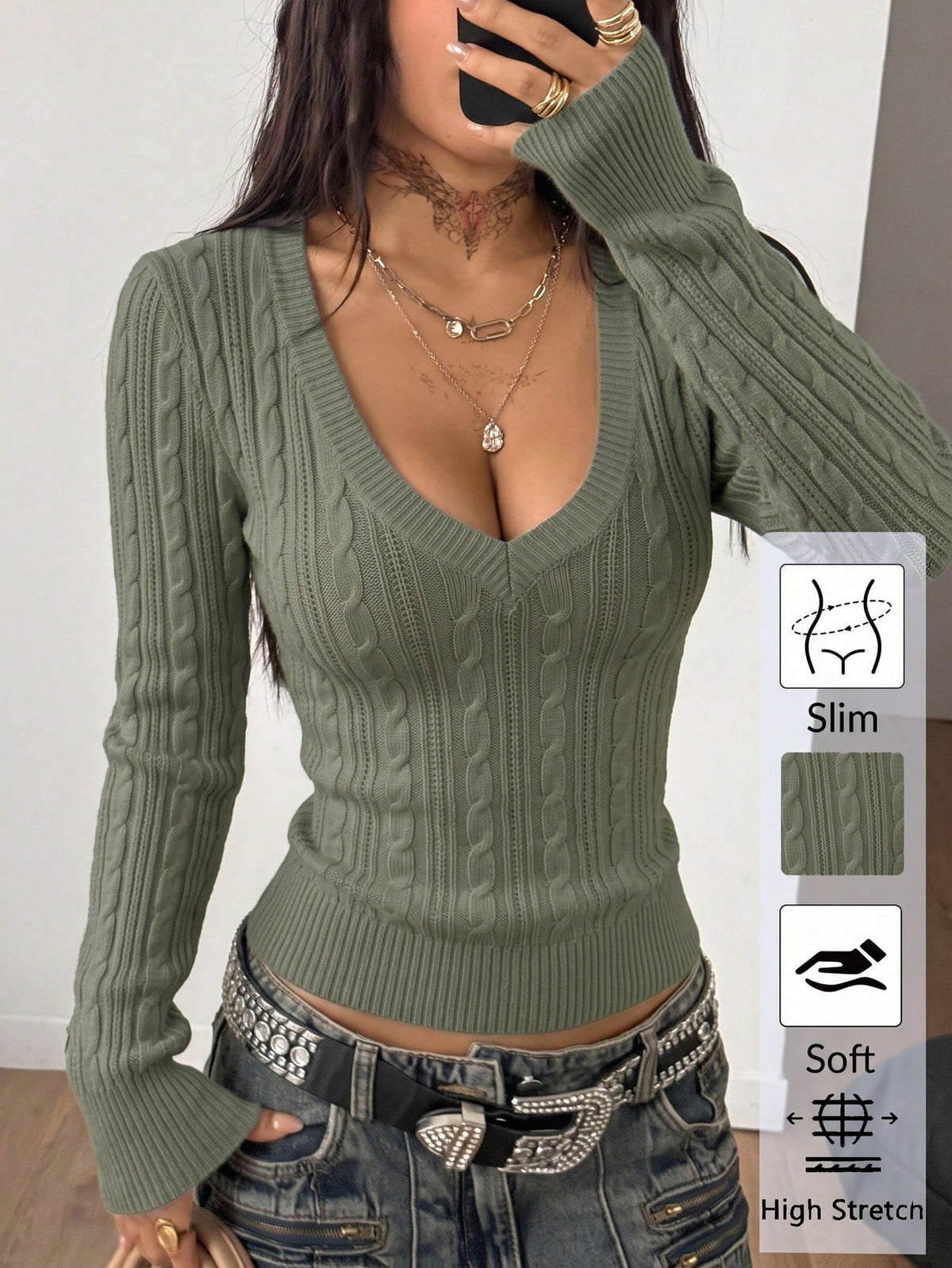 Women's slim fit cable-knit sweater with a V-neckline and long sleeves in solid green rib knit fabric.