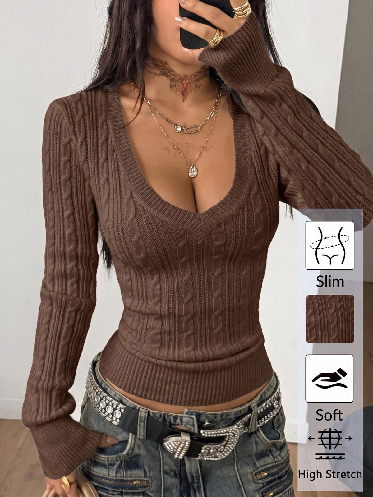 Women's slim fit cable-knit sweater with a V-neckline and long sleeves in solid green rib knit fabric.