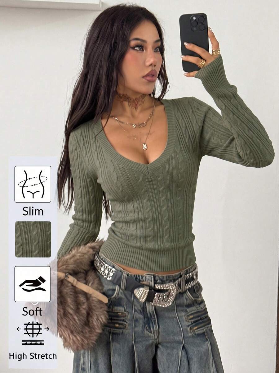 Women's slim fit cable-knit sweater with a V-neckline and long sleeves in solid green rib knit fabric.