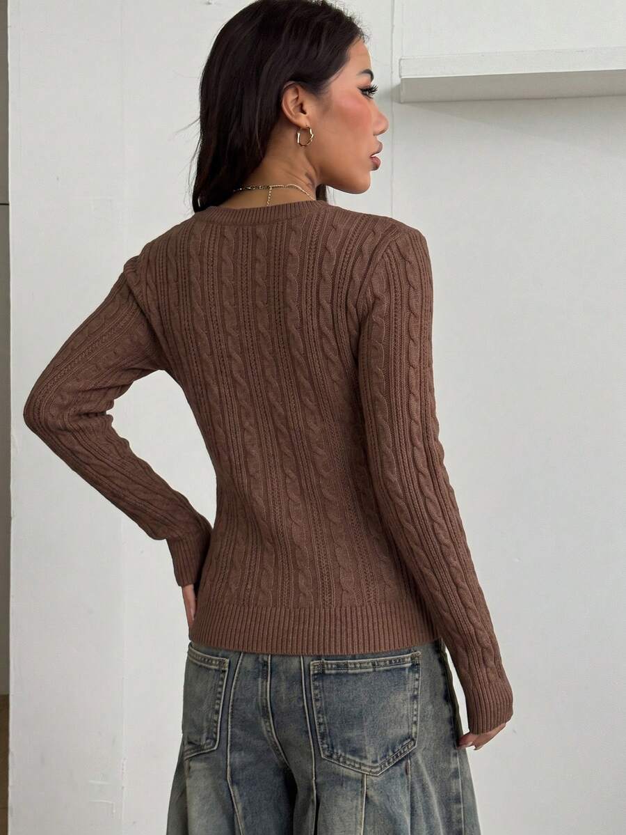 Women's slim fit cable-knit sweater with a V-neckline and long sleeves in solid green rib knit fabric.