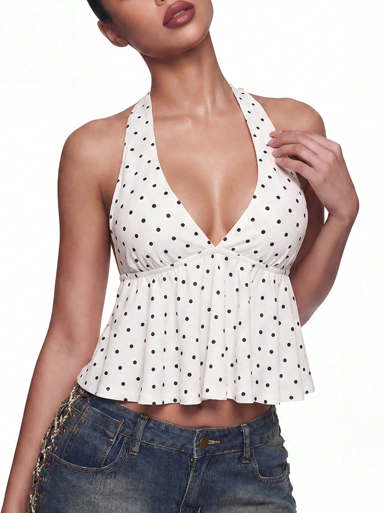 Women's polka dot print halter camisole with backless knot detail, ruched front, slim fit, and flared ruffle hem