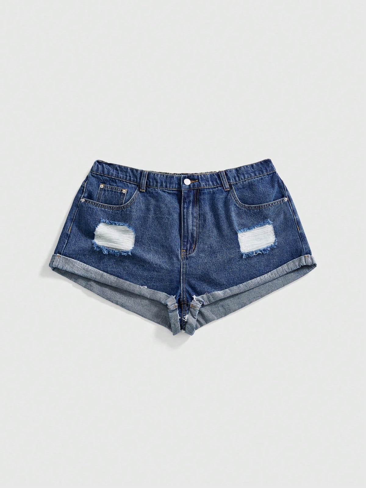Front view of women's ripped denim shorts featuring raw hem, zipper fly, and pockets