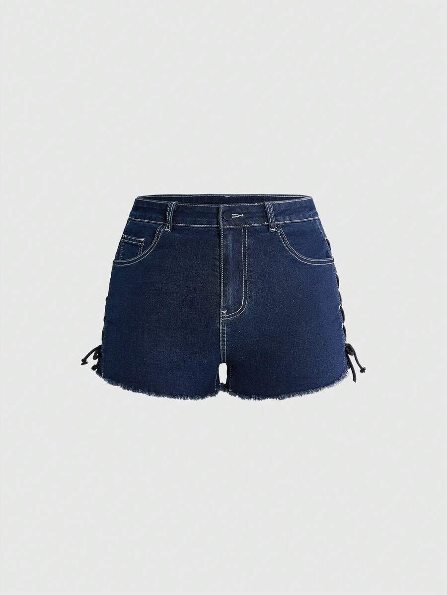 Plus size black gothic mini shorts with heart embroidery, graphic pocket pattern, lace-up detail, raw hem, and zipper fly