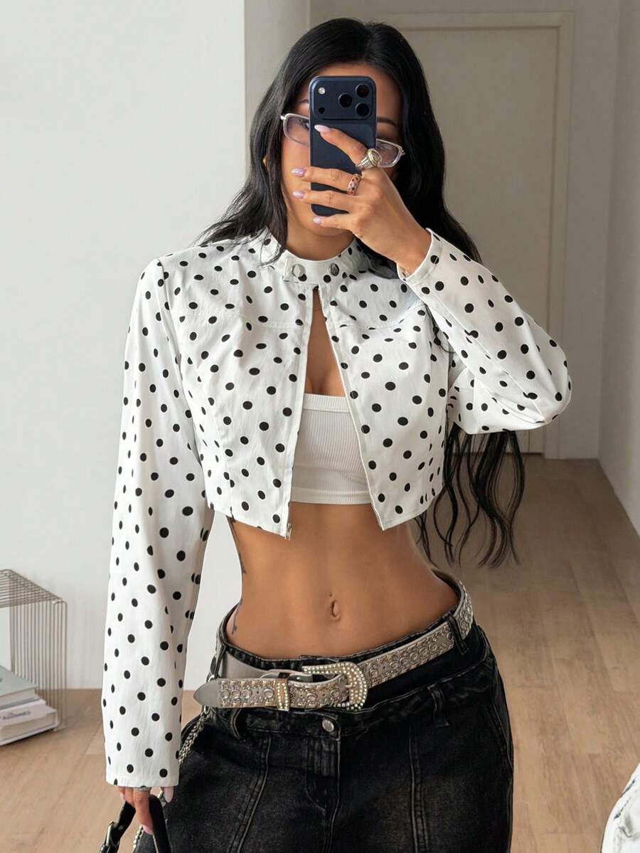 Women's metallic grey cropped faux leather jacket featuring a stand collar and asymmetrical zip front closure.
