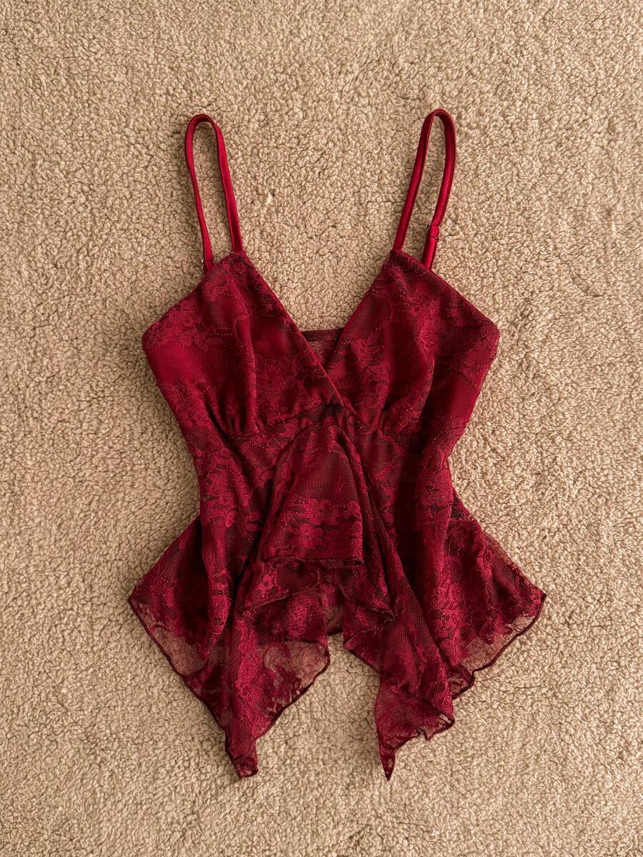 Attitoon women's Y2K style slim fit camisole top featuring contrast lace trim, spaghetti straps, plant print design, and an asymmetrical hem.