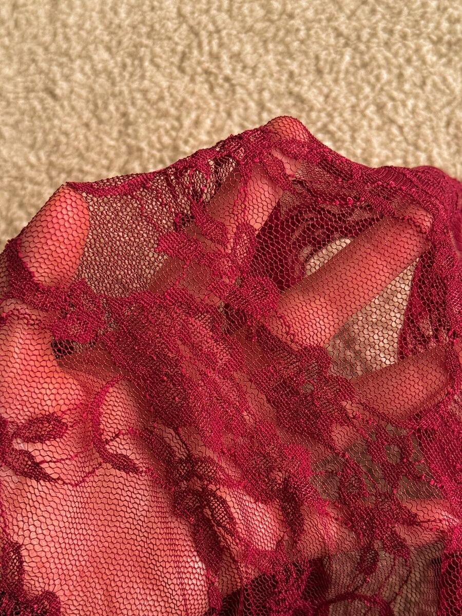 Attitoon women's Y2K style slim fit camisole top featuring contrast lace trim, spaghetti straps, plant print design, and an asymmetrical hem.