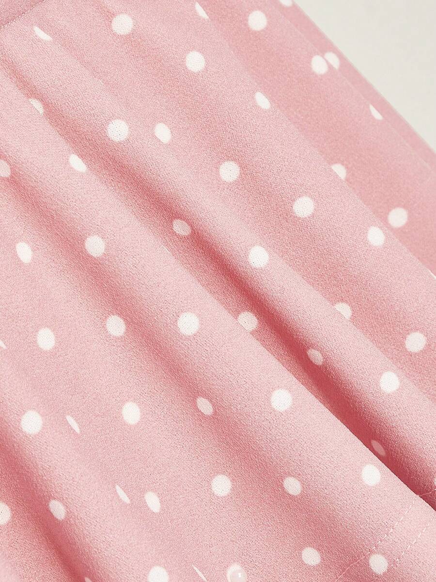 Women's polka dot print halter camisole with backless knot detail, ruched front, slim fit, and flared ruffle hem