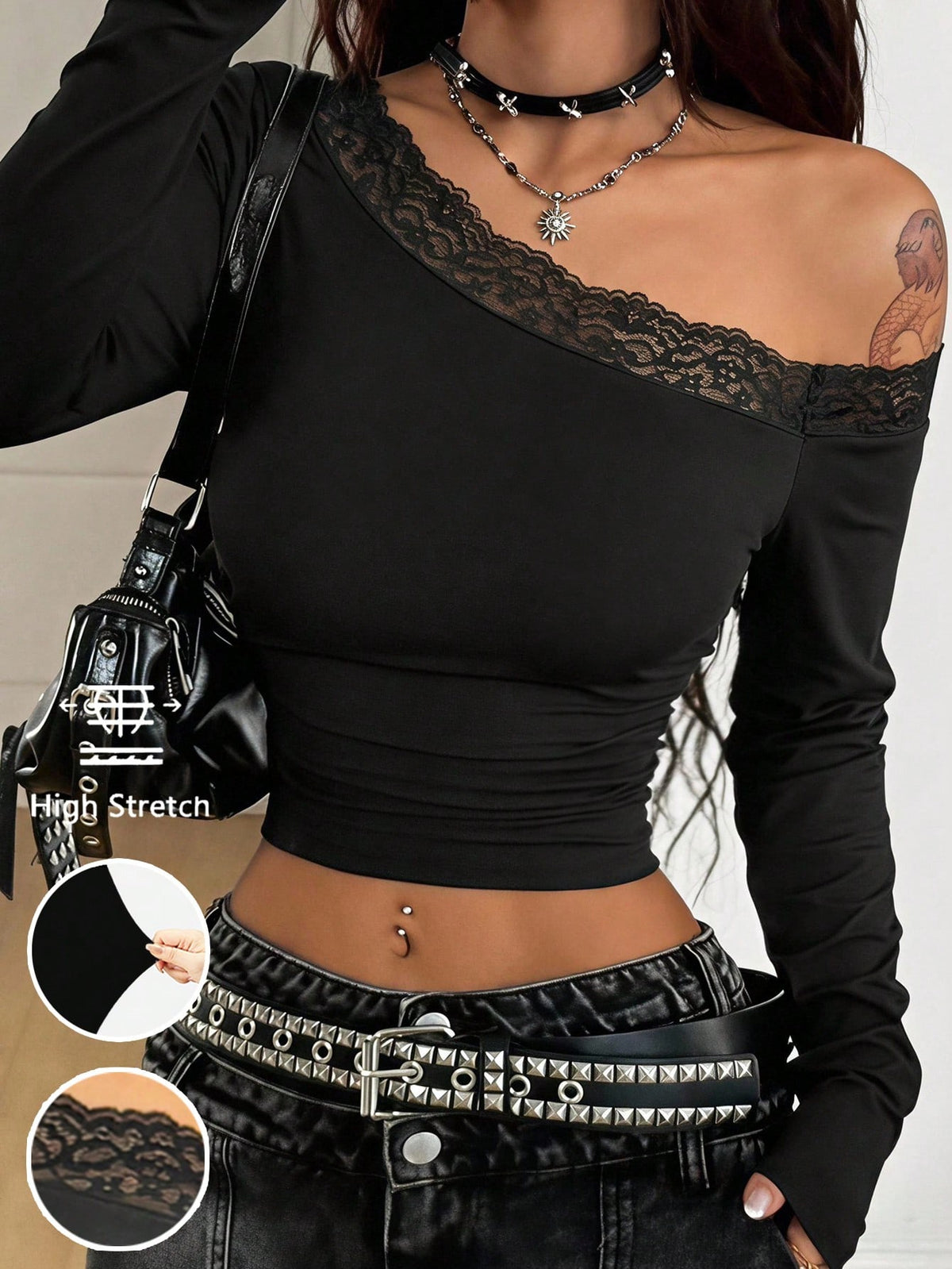 Women's slim fit long sleeve knit top featuring an asymmetrical neckline and grommet eyelet detail