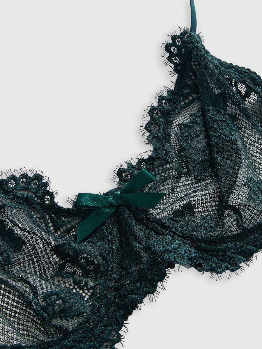 Sheer floral lace underwire triangle bra for women featuring adjustable straps and plunge cup design.