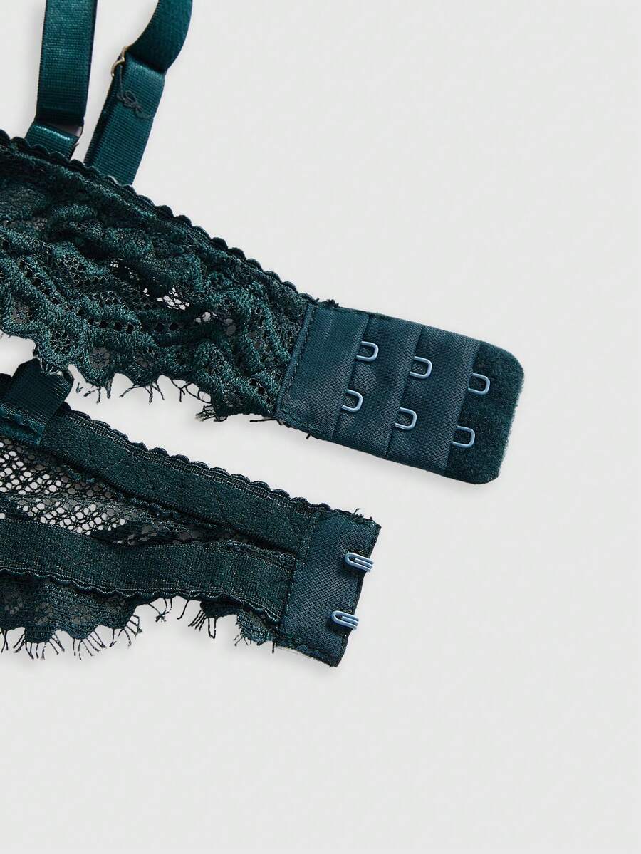 Sheer floral lace underwire triangle bra for women featuring adjustable straps and plunge cup design.