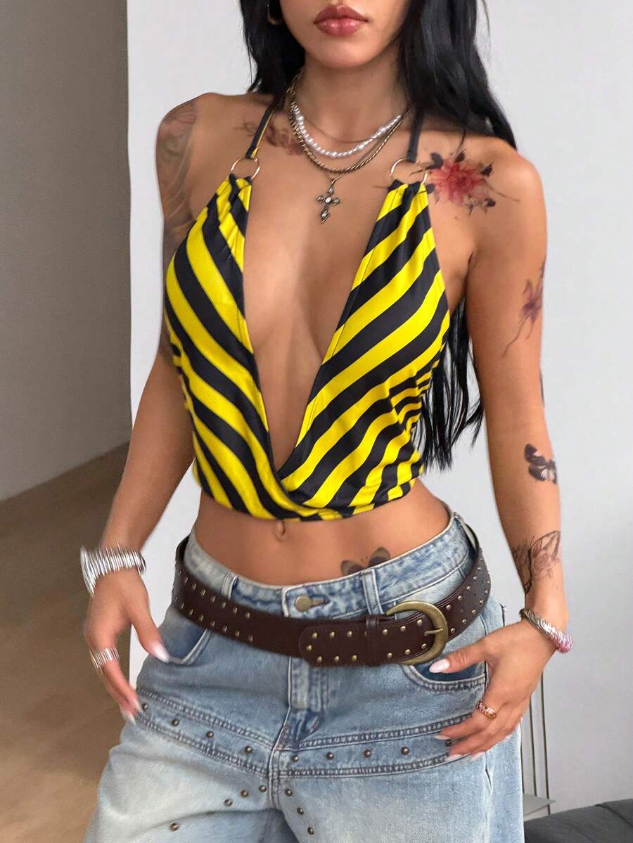 Multicolor striped halter crop tank top for women featuring a deep V-neck, metallic ring detail, and draped asymmetrical hem.