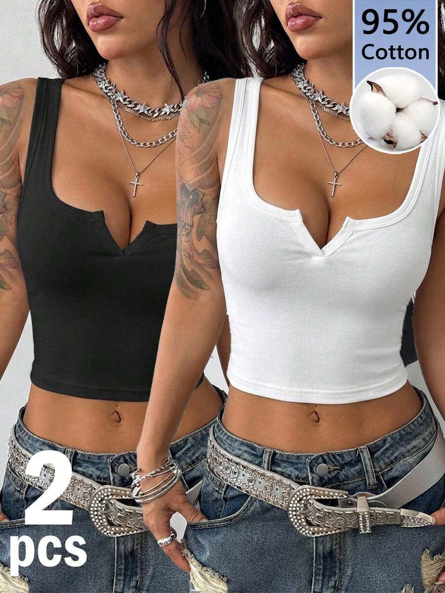 Women's striped rib-knit crop tank top with a notched neckline and slim fit.