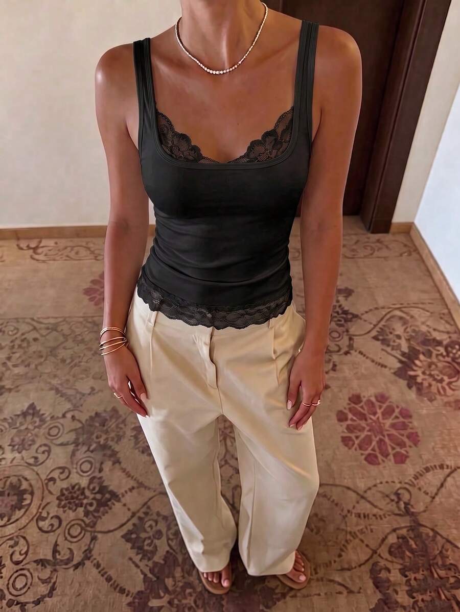 Women's slim fit camisole tank top with square neckline and lace trim detail.