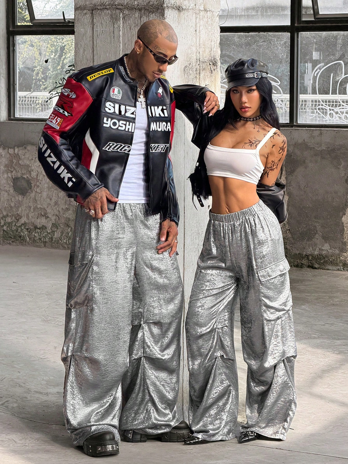 Women's high waist wide leg cargo pants featuring a black and white tree branch print and adjustable drawstring closure.