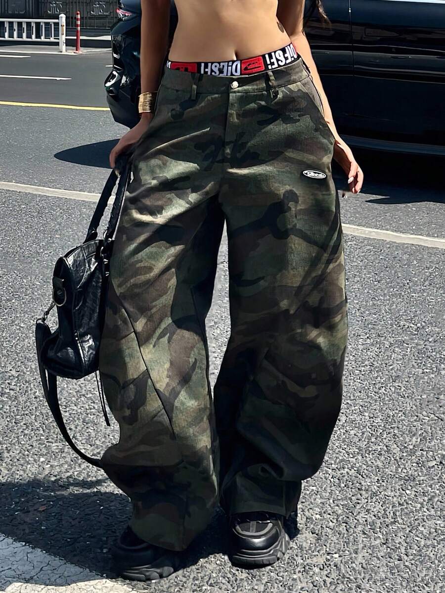 Women's loose straight leg baggy low rise denim pants with functional pockets and zipper fly closure