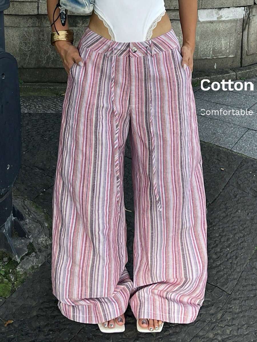 Women's casual straight leg striped woven pants featuring a low waist and zipper fly closure.