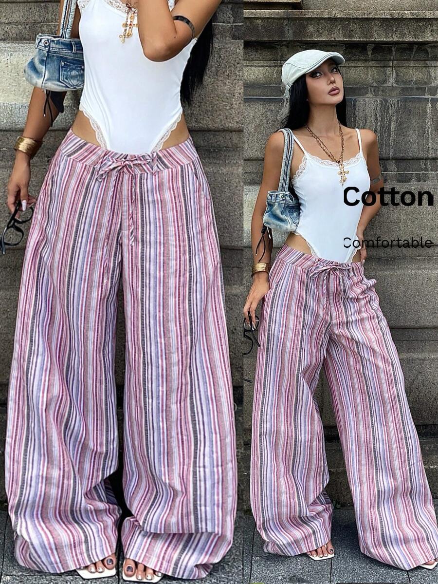 Women's casual straight leg striped woven pants featuring a low waist and zipper fly closure.
