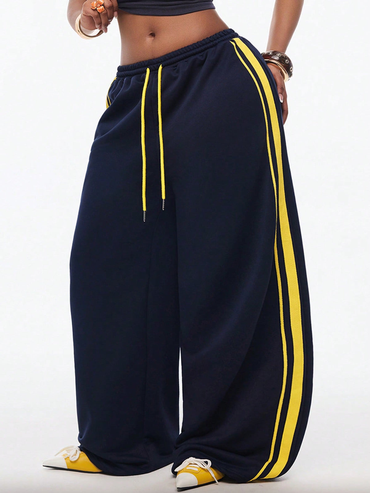 Women's wide leg trousers with a tree branch graphic pattern, loose fit, and mid-rise waist in woven fabric.